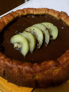 A picture of Mango Purée Cake w/ Dark Chocolate Toppings.