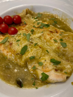 A picture of Chicken Poblano Enchiladas with Green Sauce.