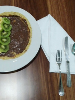 Una foto de Creppe de Nutella y frutas😉