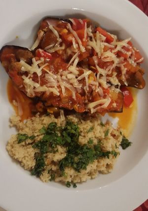 A picture of Baked aubergine and couscous.