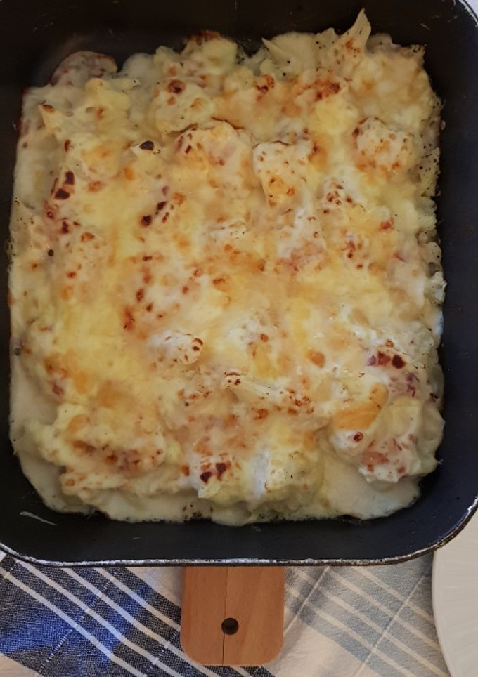 Una foto de Coliflor con bechamel de jamón gratinada