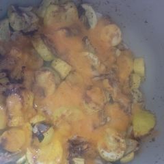 A picture of Cheesy Roasted Squash and Onion.