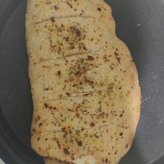 A picture of Cheezy stuff garlic breadstick.