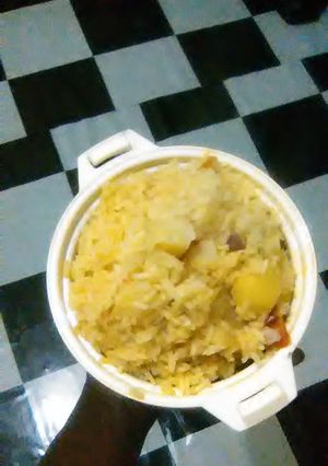 A picture of Turmeric rice with potatoes.