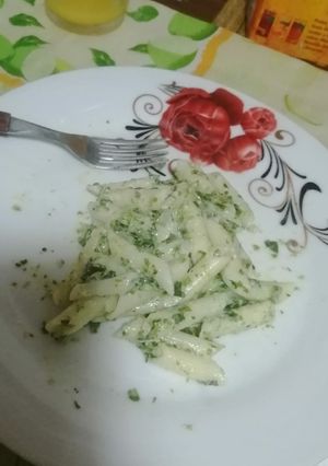 Una foto de Mostacholes con salsa de espinaca