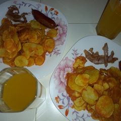 A picture of Bhajia with tumeric spice.