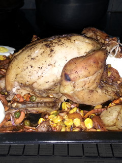 A picture of Roast stuffed chicken.