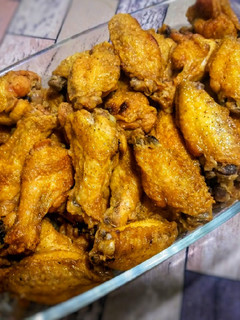 Una foto de Alitas de pollo fritas