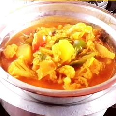 A picture of Egg Curry with Cauliflower.
