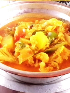 A picture of Egg Curry with Cauliflower.