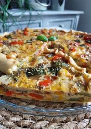 Une photo de Tarte salée aux poivrons, courgettes et mozzarella