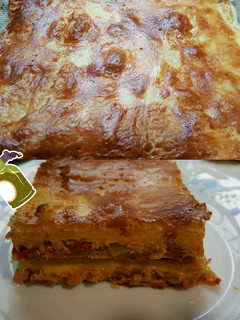Una foto de Empanada de melva, pimiento del piquillo y queso cheddar