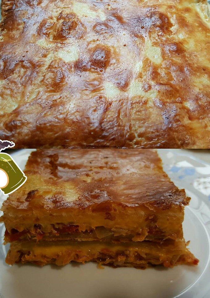 Una foto de Empanada de melva, pimiento del piquillo y queso cheddar