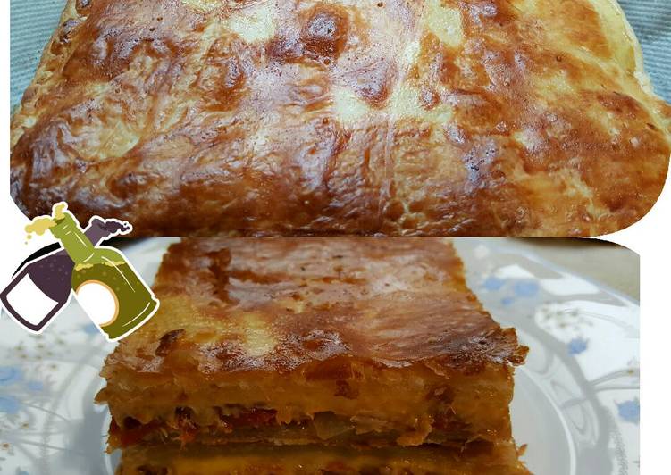 Empanada de melva, pimiento del piquillo y queso cheddar