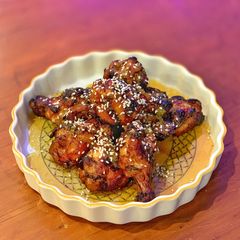 A picture of Honey lemon chicken wings.