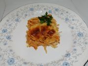 Una foto de espaguetis al horno