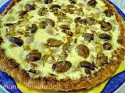 Una foto de quiche champiñon