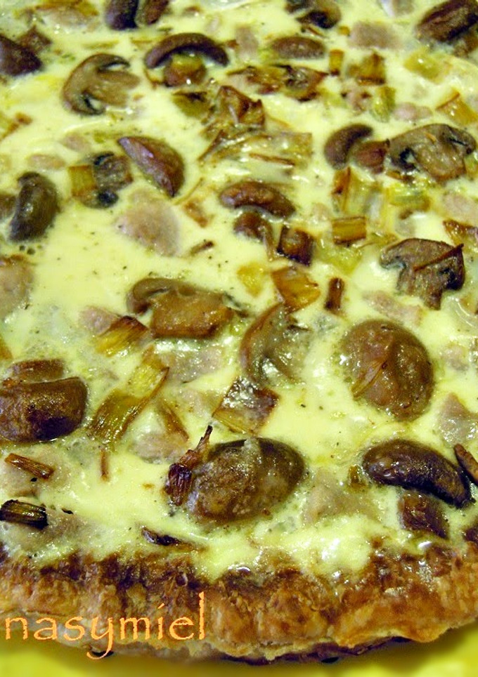 Una foto de Quiche con secreto, queso de cabra y champiñones
