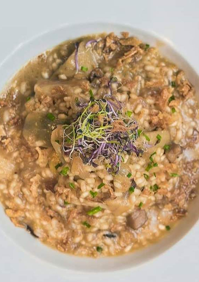 Una foto de Arroz meloso con verduritas y pollo