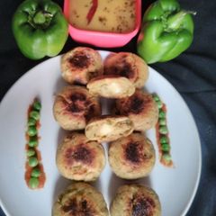A picture of Mixed veg stuffed cheese baati.