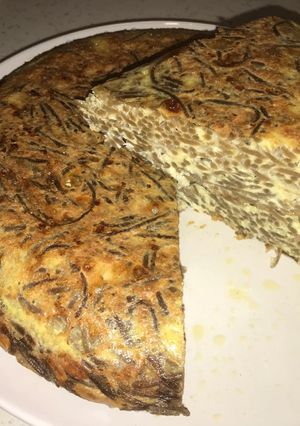 Una foto de Tortilla de spaghetti de setas con queso