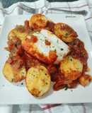 Bacalao al horno con tomate y patatas