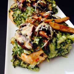 A picture of Chicken Breasts with Creamed Spinach and Buttered Mushrooms.