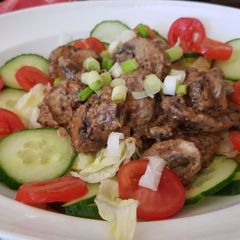 A picture of Balsamic Mustard Mushrooms in a creamy sauce & Salad.