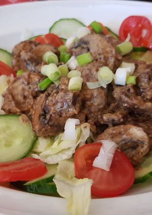 A picture of Balsamic Mustard Mushrooms in a creamy sauce & Salad.