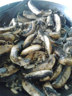 Una foto de Portobellos al ajillo