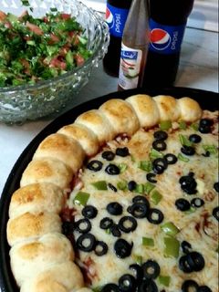 صورة لوصفة بيتزا لذيذه