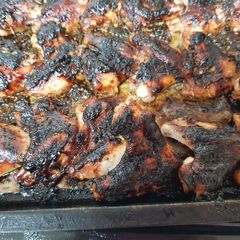 A picture of My Glassa A Base Do Ace to Balsamico Do Modena, Chicken wings.