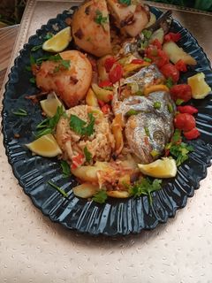 صورة لوصفة طبق من الاسماك مع الخضر 🌶🧅🥕🐋🐟