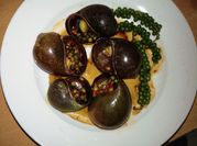 A picture of ốc bươu nướng