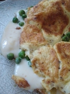 Una foto de Omelette de arvejas con queso