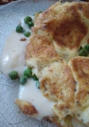 Una foto de Omelette de arvejas con queso 