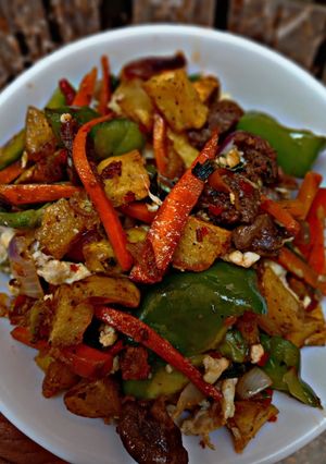 A picture of Potato and veggies.