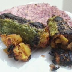 A picture of Potato Stuffed Grilled Karela(Bitter gourds).