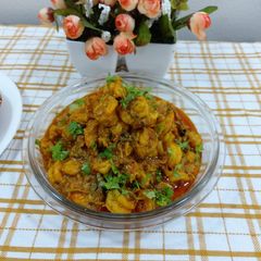A picture of Prawns onion tomato masala.