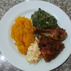 A picture of Grilled chicken and Hubbard squash.