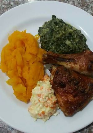 A picture of Grilled chicken and Hubbard squash.