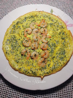 Una foto de Tortilla descubierta de gambas