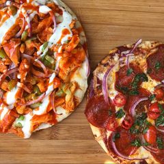 A picture of Buffalo style + pepperoni pizza.