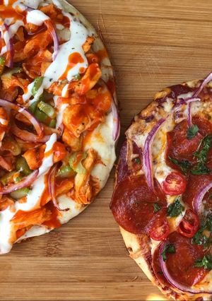 A picture of Buffalo style + pepperoni pizza.