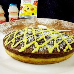Yakult Tripe layered choco custard biscuit cake A picture of Yakult Tripe layered choco custard biscuit cake.