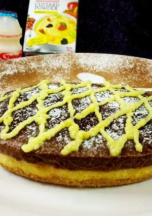 A picture of Yakult Tripe layered choco custard biscuit cake.