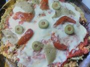 Una foto de pizza de coliflor
