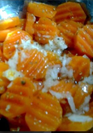 Una foto de Zanahorias encebolladas