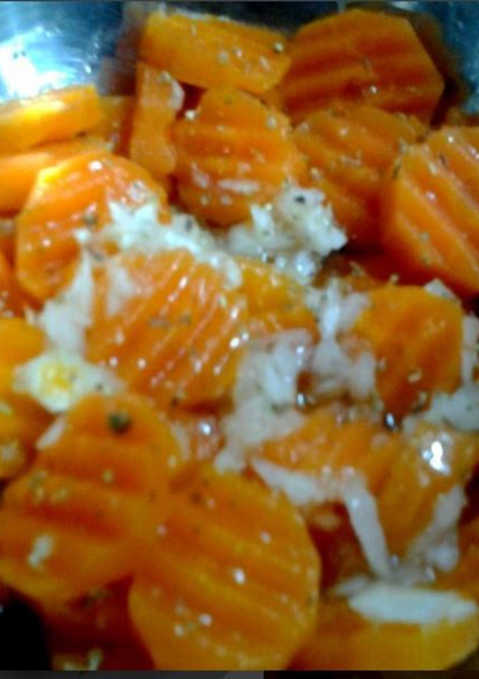 Una foto de Zanahorias encebolladas