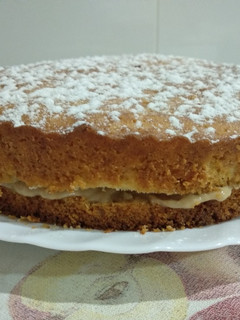 Una foto de Bizcocho relleno de crema de café